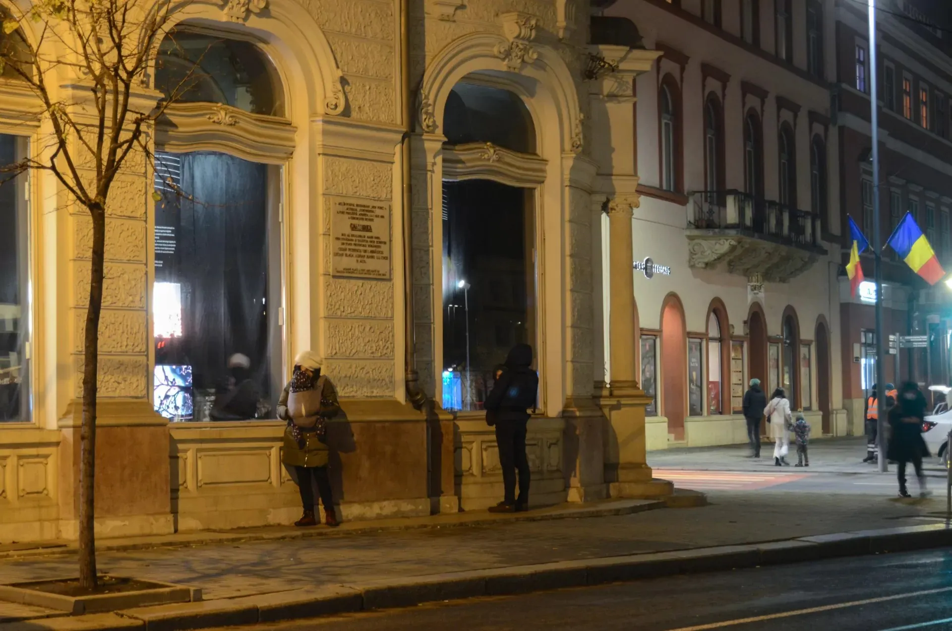 Exhibition view of ArchaeaBot and Susceptible presented in the windows of the former Hotel Continental in Cluj-Napoca.