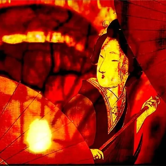 Kaidan installation view showing illuminated masks and projected imagery among bamboo screens at night in Kyoto Garden.